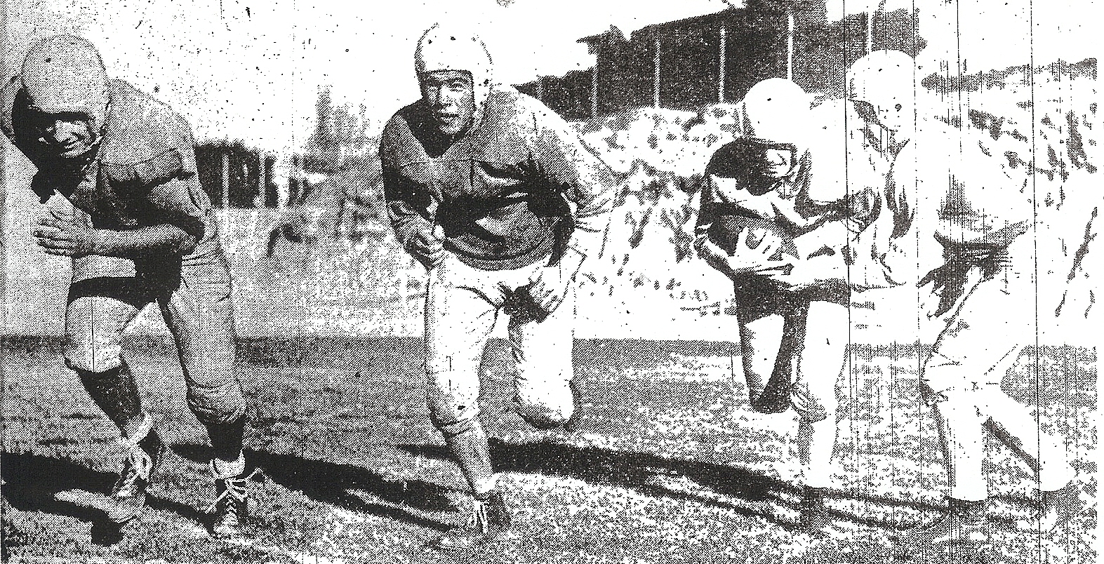 Point Loma relied on backs Ed Perreria, Eddie Silva, and Marshall Malcolm (from left),. who accepted handoff from quarterback Jim Dible.