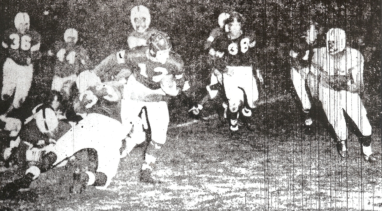 Hoover's Joe Duke avoided San Diego's Darnes Johnson (33), but Charlie Powell came up to make tackle.