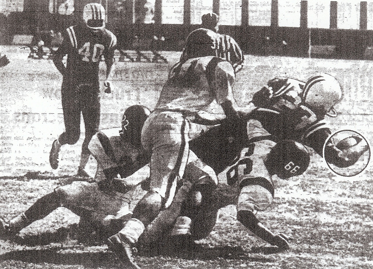 Crawford halfback Don Young scored first touchdown in city carnival, shaking off La Jolla's Dan Berry (22), Don Holder (31), and Bob Young (66).