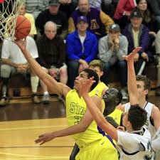 UT-San Digo photographer catches Kell putting up two of his 37 points against La Costa Canyon,