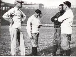 The 1922 Golden Bears' coaching staff. Nibs is second from left, next to Andy smith (left).