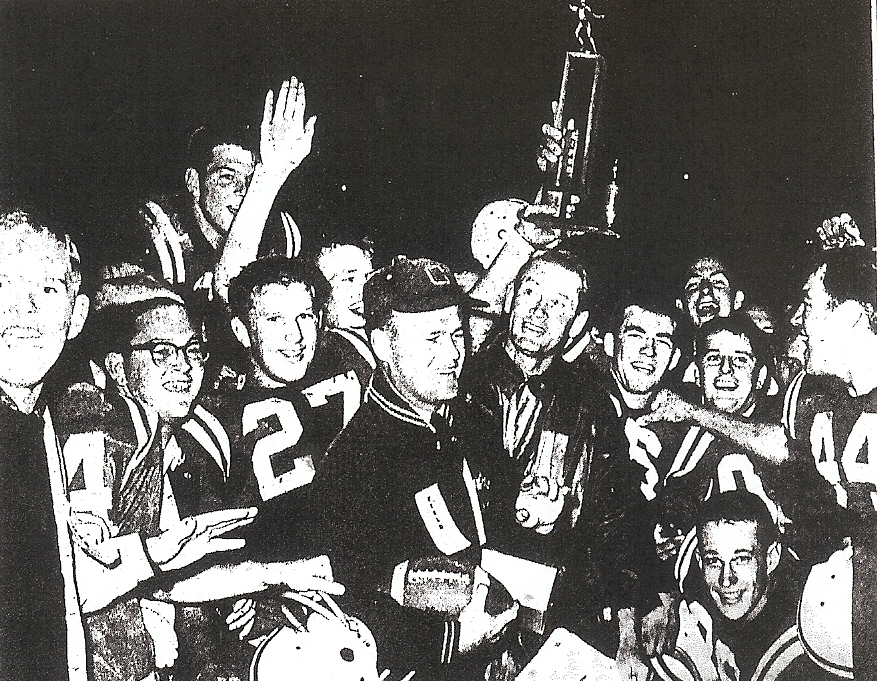 Coaches Frank Smith (left) and Walt Harvey were surrounded by winning Colts following 13-0 shutout of Kearny.