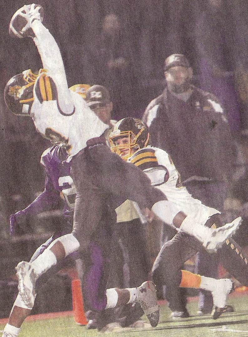 El Camino made plays such as this interrception by C.J. Simmons to upset Steele Canyon as UT-San Diego cameraman Misael Virgen focused his lens on one-handed snatch.