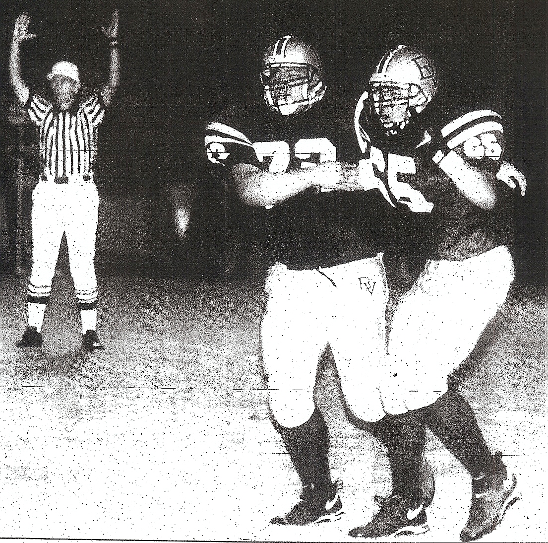 Bonita Vista linemen Billy Metzger (left) and Reggie Nance celebrate touchdown in Barons' 20-6 victory over Orange Glen, their first-ever against a North County team.