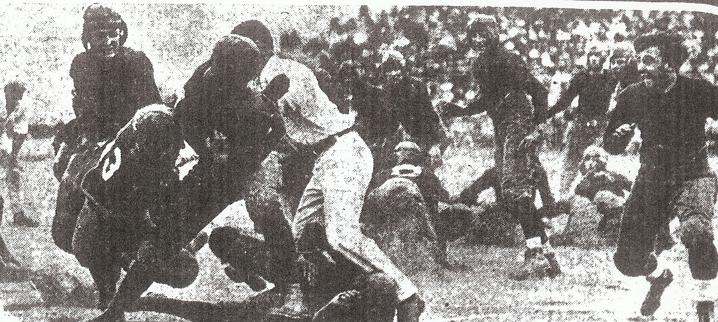 Pasadena appeared to have a 12th defender, the game umpire, as it attempted to stop San Diego fullback Bert Ritchey.
