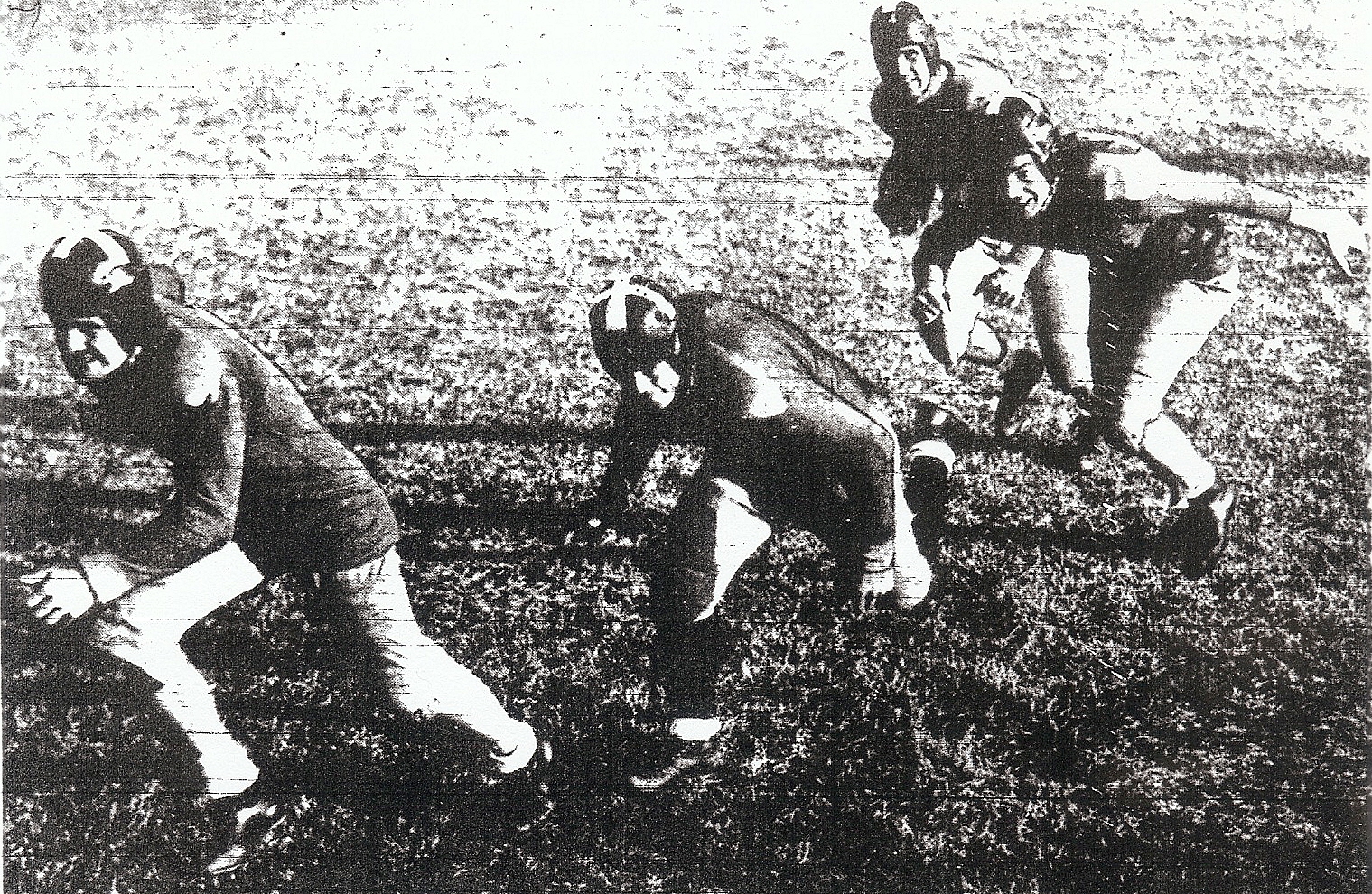 Trometter (left) was lead blocker for MCRD Devildogs and ball carrier Don Gibson (rear) in 1937.